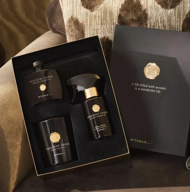Zestaw podarunkowy kosmetyki Rituals dla firm z kolekcji Precious Amber w eleganckim czarnym opakowaniu