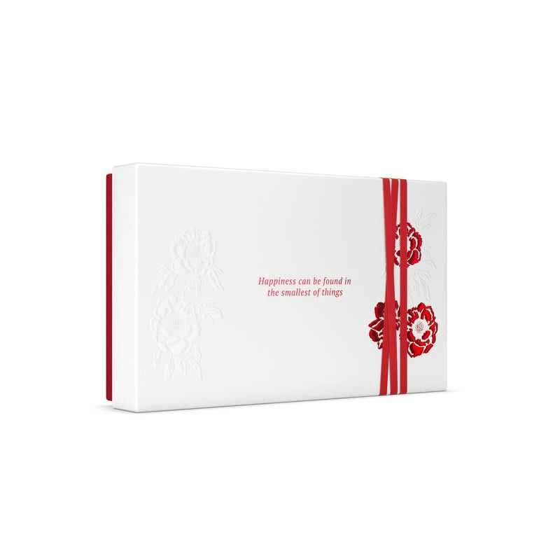 Rituals the ritual of ayurveda zestaw upominkowy eleganckie białe pudełko z czerwonymi kwiatami i wstążką