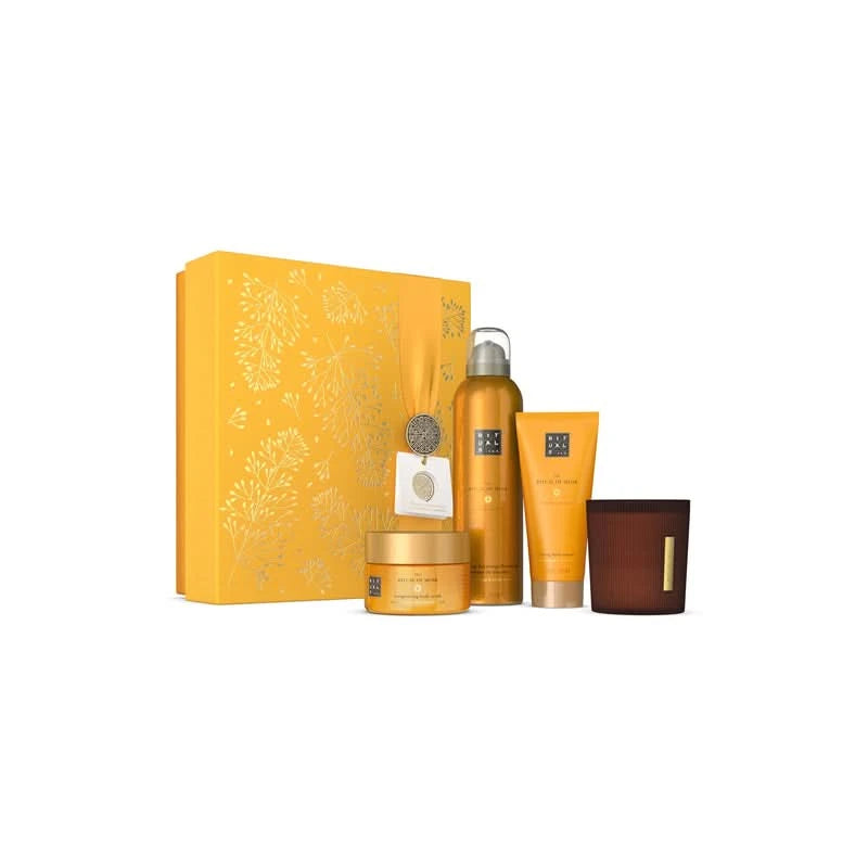 Zestaw prezentowy Rituals Mehr dla firm z kosmetykami i świecą w eleganckim złotym opakowaniu