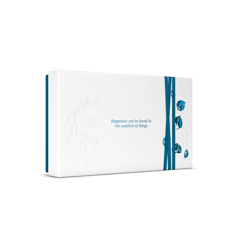 Elegancki zestaw upominkowy Rituals Hammam dla firm w białym pudełku z niebieską wstążką