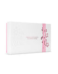 Elegancki zestaw upominkowy Rituals Sakura dla firm w białym pudełku z różowym nadrukiem kwiatów