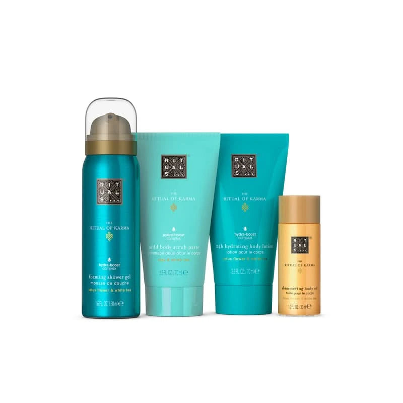 zestaw prezentowy Rituals Karma dla firm z pianką do mycia, peelingiem, mleczkiem i olejkiem do pielęgnacji ciała